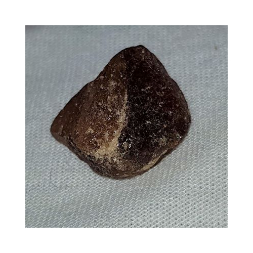 flat dark coloured imperial topaz crystal