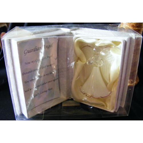 glass praying guardian angel figure in book shaped box