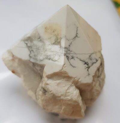 howlite part polished point showing crack
