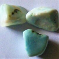 small polished pieces of larimar