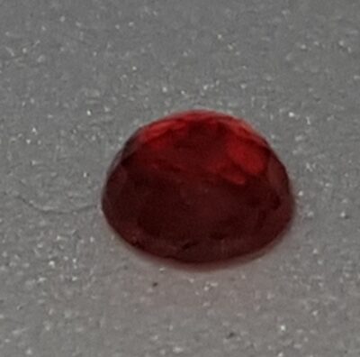 red faceted sapphire