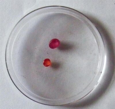 red and orange faceted sapphire