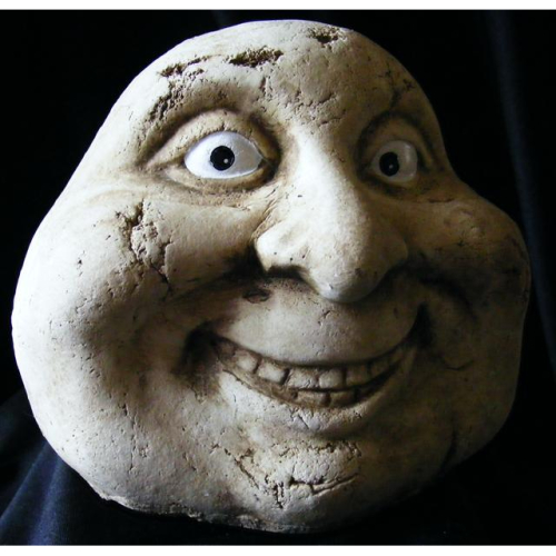 smiling stone man garden ornament