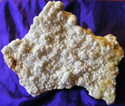 large prehnite plate that looks shaped like australia