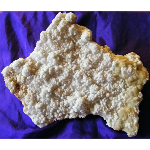 large prehnite plate that looks shaped like australia