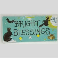 small sign with cat bat witch moon and words bright blessings
