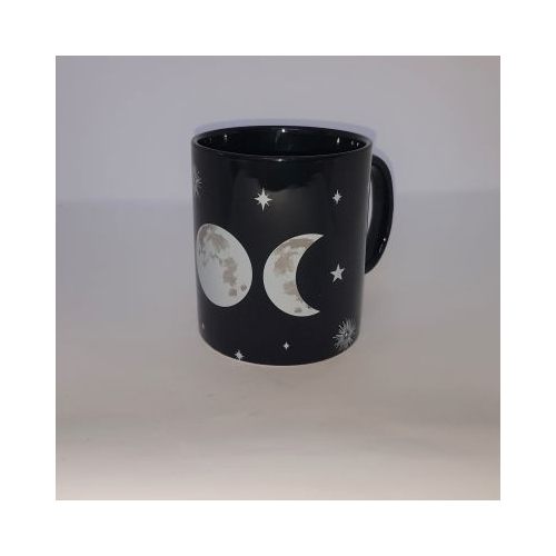 black mug with triple moon and stars design side view