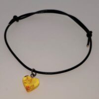 small amber heart on leather thong wristband