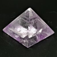 small amethyst pyramid black background