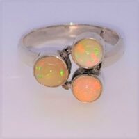3 round ethopian opals in silver ring