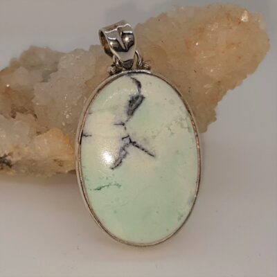 oval gem silica in silver pendant