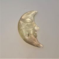 crescent moon face in citrine