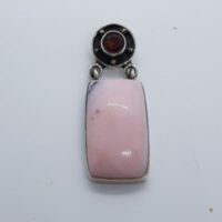 rectangular pink opal with garnet at the top in silver pendant