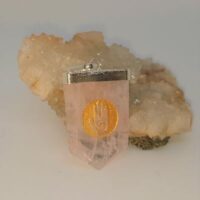 rose quartz bullet pendant with gold healing hand decoration
