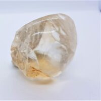 part polished rutilated quartz freeform 1 side view