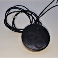 shungite pendant with om design