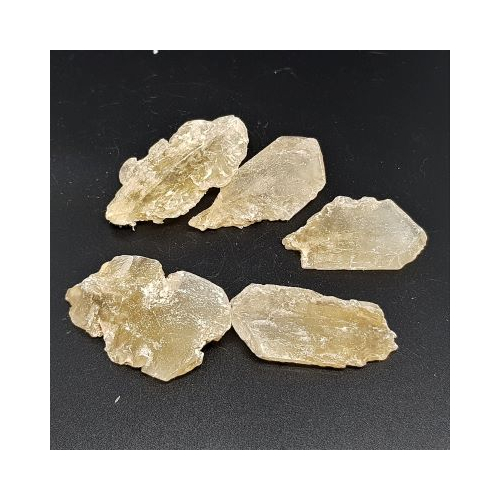 small pieces of fluorescent selenite crystals