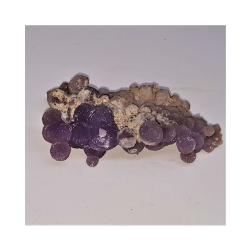 small piece of grape agate side view