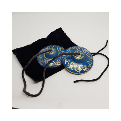 blue coloured tingsha with gold decoration on the top with pouch
