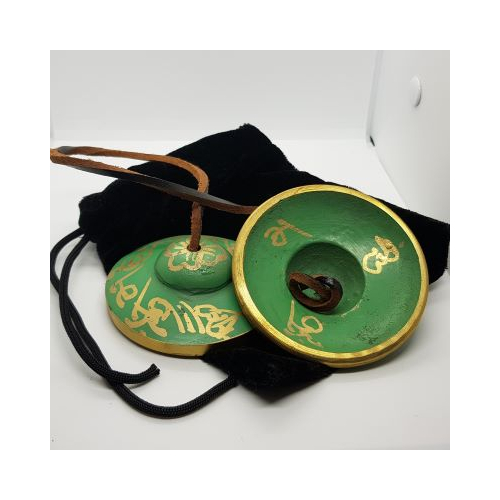 green tingsha in pouch