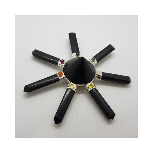 black tourmaline generator with cone in the centre and different small stones on each of 7 points