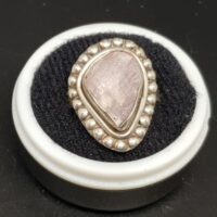 natural kunzite in patterned silver setting ring