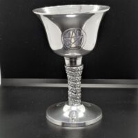 silver coloured chalice with pentagram decoration