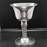 silver coloured chalice with triple moon decoration