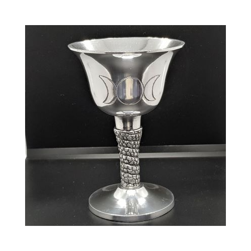 silver coloured chalice with triple moon decoration