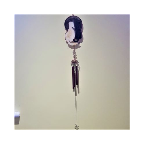 black and white cat wind chime