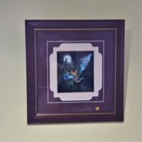 framed print with fancy mount of a bat
