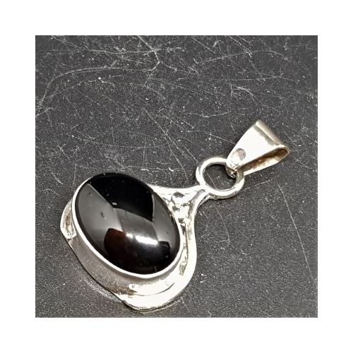 native american made silver fancy setting pendant set with black onyx close up
