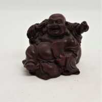 small red laughing buddha