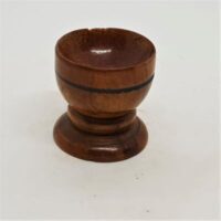 small egg cup style wooden sphere or crystal ball holder