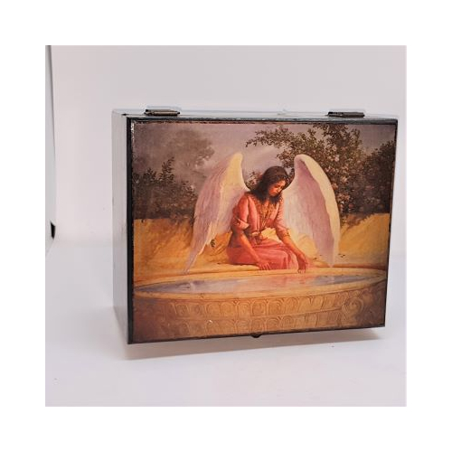 large box with fairy looking into bowl of water design