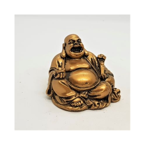 small gold coloured laughing buddha