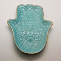 hand of fatima shaped trinket dish turquoise coloured with gold rim