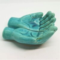 large turquoise blue hands
