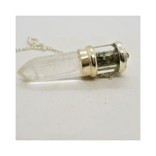 clear quartz bullet pendulum with moldovite chips above