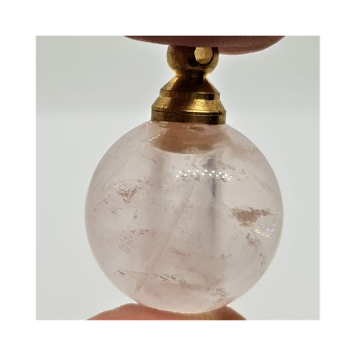 small spherical quartz perfume bottle with loop for chain