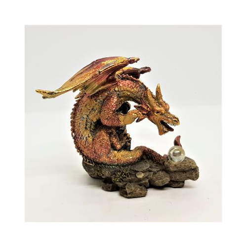 resin red and gold dragon figure with crystal ball