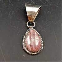 native american made teardrop shaped pendant in silver set with rhodochrosite and heavy bail