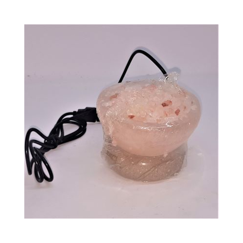 salt lamp holding himalayan salt large grains top view