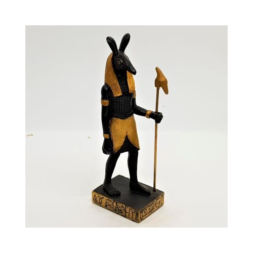 black and gold seth figure front view