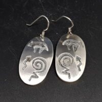 native american made large silver oval earrings with bear and power symbols engraved