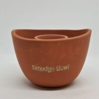 terracotta smudge pot with central part to hold smudge stick side view showing words smudge bowl