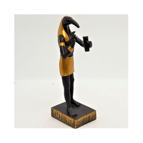 black and gold thoth figure