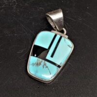 native american made silver rectangular pendant inlaide with turquoise and black onyx