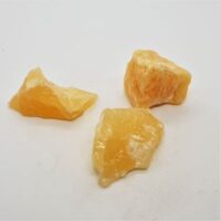 small pieces of natural orange calcite