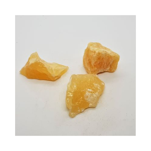 small pieces of natural orange calcite